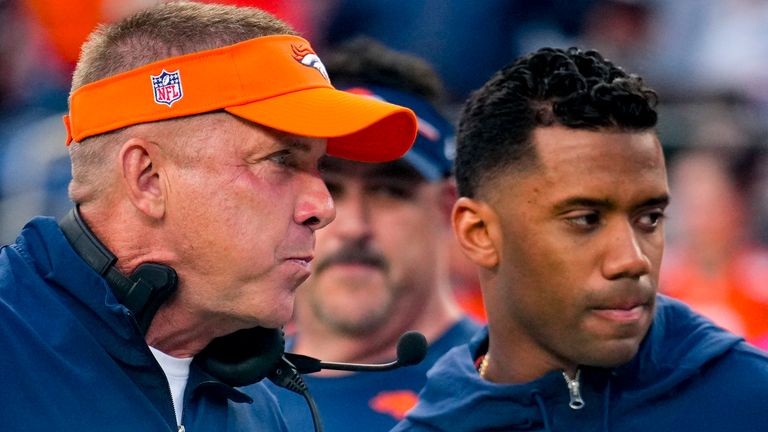 Denver Broncos head coach Sean Payton talks with Denver Broncos quarterback Russell Wilson (3) during a preseason NFL football game against the Los Angeles Rams Saturday, Aug. 26, 2023, in Denver. (AP Photo/Jack Dempsey)