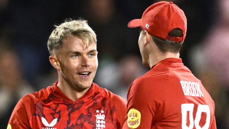 Sam Curran (left) and Harry Brook (right) during T20 international cricket action for England (Associated Press)