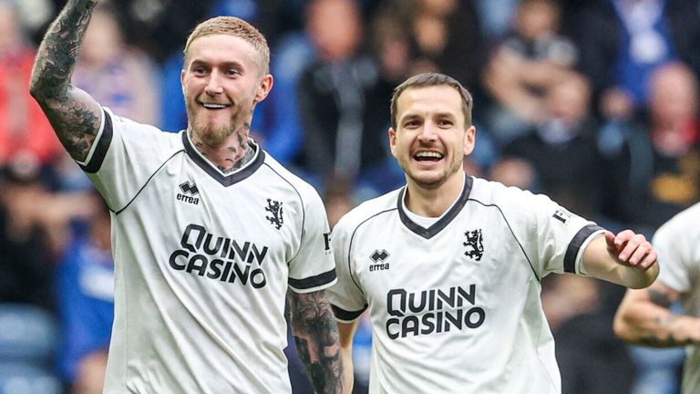 Craig Sibbald celebrates with Kristijan Trapanovski as Dundee United take a 2-1 lead at Rangers