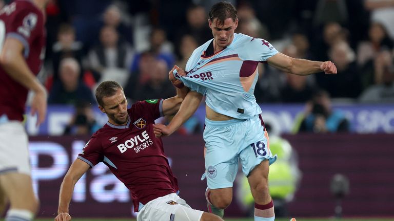 West Ham United's Tomas Soucek (left) tackles Brentford's Yehor Yarmolyuk
