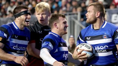 Bath's Will Butt celebrates with team-mates after scoring their side's third try against Saracens