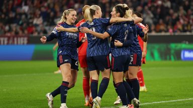 Emily Fox celebrates with her teammates after giving Arsenal an early lead at Bayern Munich