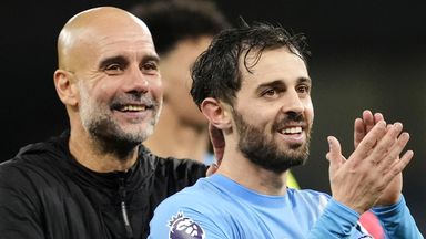 Pep Guardiola and Bernardo Silva celebrate Man City's win over Liverpool