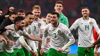 Parrott celebrates with his Ireland team-mates after completing his hat-trick
