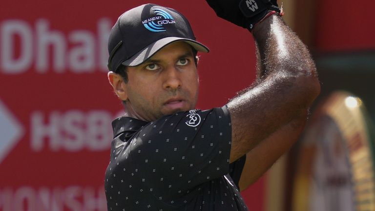 Aaron Rai of England hits off the first tee during the third round (AP Photo/Altaf Qadri)