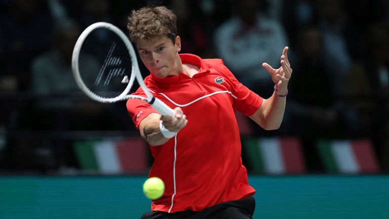Belgium's Alexander Blockx plays Italy's Matteo Berrettini during their Davis Cup tennis match at the Unipol Arena, Bologna, Italy, Friday, Sept. 13, 2024. (Massimo Paolone/LaPresse via AP)