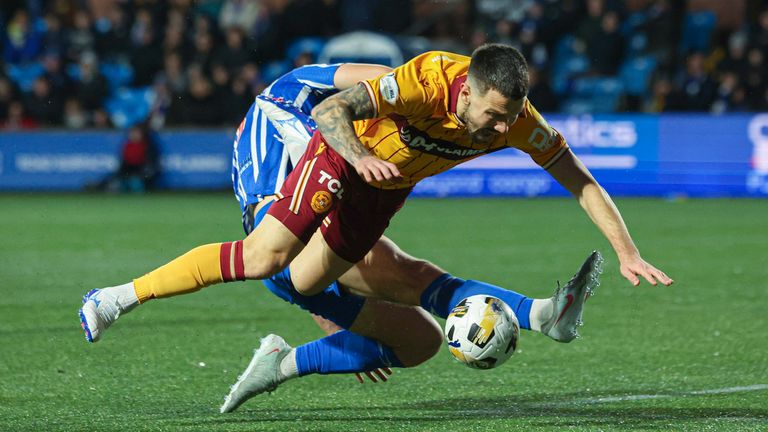 Motherwell were awarded a penalty for Mayo's foul on Stamatelopoulos