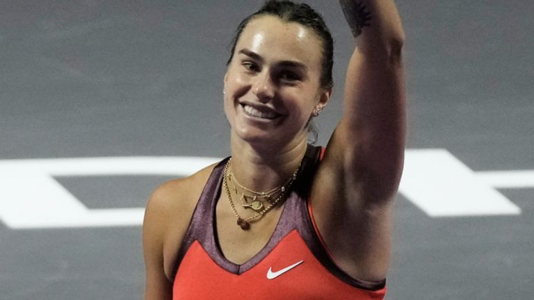 Aryna Sabalenka of Belarus celebrates after her win against Coco Gauff of the United States in the women's singles match at the WTA tennis finals in Riyadh, Saudi Arabia, Thursday, Nov. 6, 2025. (AP Photo/Fatima Shbair)