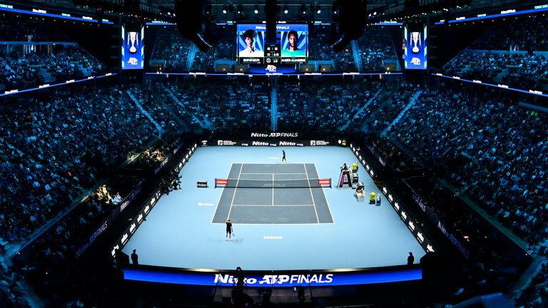 TURIN, ITALY - NOVEMBER 10: General view of Jannik Sinner of Italy  plays a backhand against Felix Auger-Aliassime of Canada during the Group Stage match on day two of the Nitto ATP Finals 2025 at Inalpi Arena on November 10, 2025 in Turin, Italy. (Photo by Stefano Guidi/Getty Images)