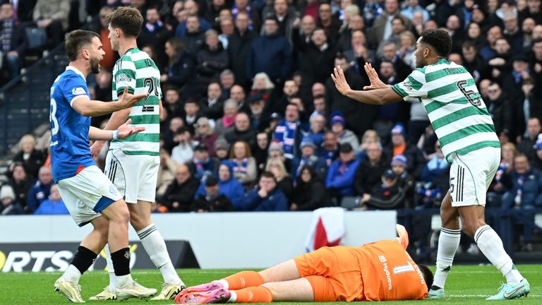 Celtic's Auston Trusty pleads his innocence after kicking Rangers' Jack Butland at Hampden Park