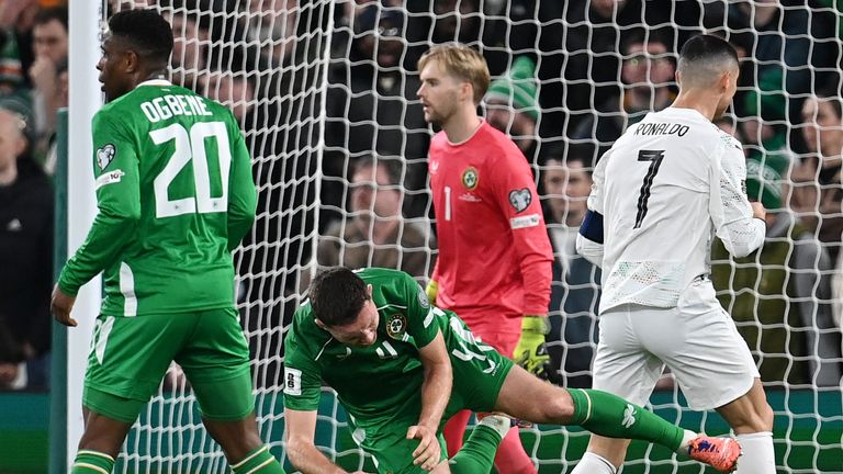 Cristiano Ronaldo fouls Dara O'Shea during Portugal's match against Republic of Ireland on November 13, 2025