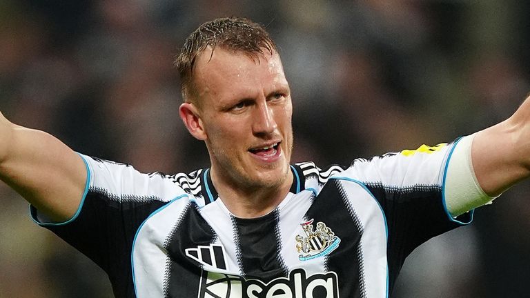 Newcastle United's Dan Burn celebrates scoring their side's first goal during the UEFA Champions League match at St James' Park, Newcastle