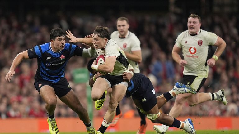 Wales' Dan Edwards on his way to score a try in the Quilter Nations Series match against Japan