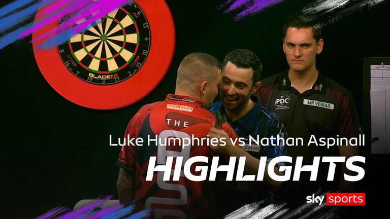 Highlights from the Grand Slam of Darts group stage match between Luke Humphries and Nathan Aspinall.