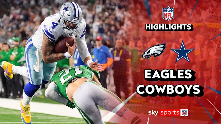 Dallas Cowboys quarterback Dak Prescott (4) leaps over Philadelphia Eagles safety Sydney Brown to score a touchdown during the second half of an NFL football game Sunday, Nov. 23, 2025, in Arlington, Texas. (AP Photo/Tony Gutierrez)