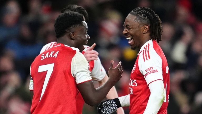 Arsenal's Eberechi Eze (right) celebrates his hat-trick with Bukayo Saka
