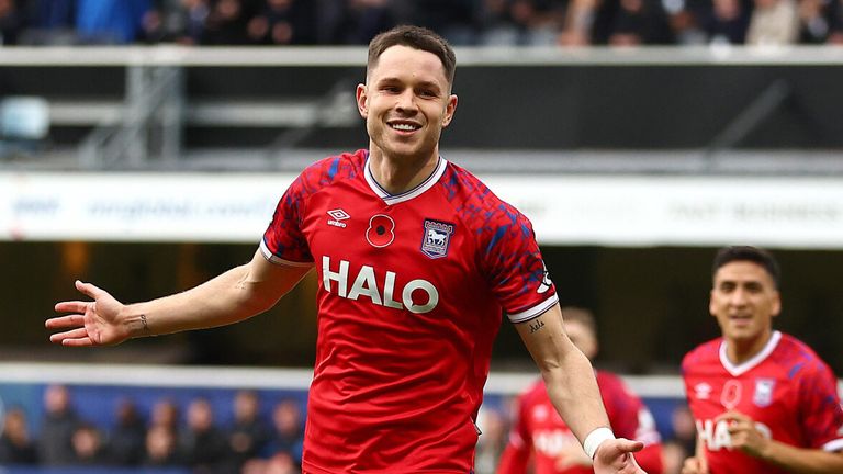 George Hirst celebrates after opening the scoring for Ipswich at Loftus Road