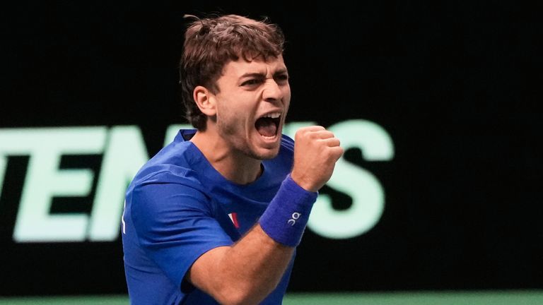 Italy's Flavio Cobolli celebrates at the Davis Cup (Associated Press)