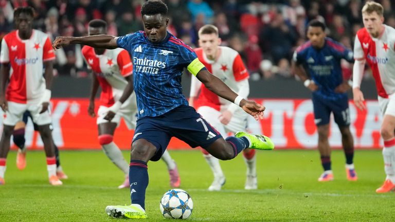 Arsenal's Bukayo Saka scores a penalty during the Champions League match against Slavia Prague