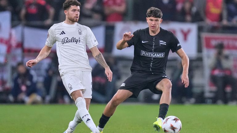 Nottingham Forest's Neco Williams, left, vies for the ball with Sturm's Arjan Malic during the Europa League