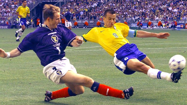 Kevin Gallacher of Scotland, left, tackles Brazil's Dunga during the opening game of the 1998 World Cup 