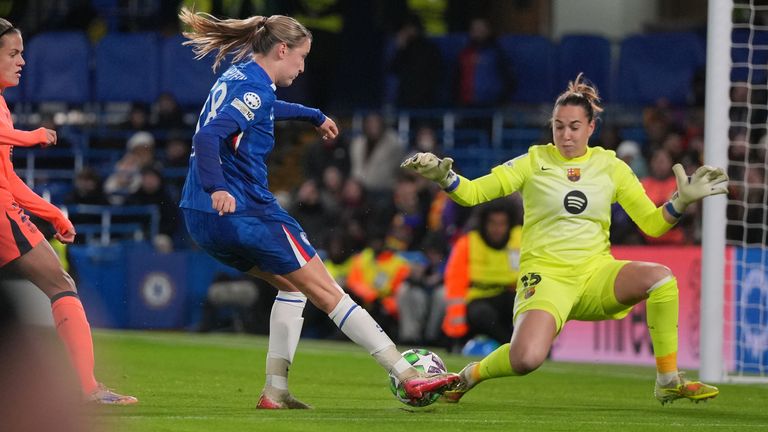 Chelsea's Wieke Kaptein attempts a shot at goal in front of Barcelona goalkeeper Catalina Coll during the Women's Champions League