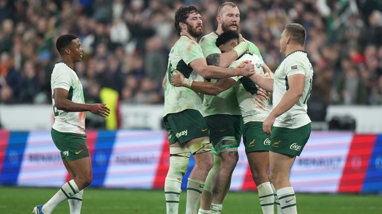 South Africa players celebrate after victory in Paris