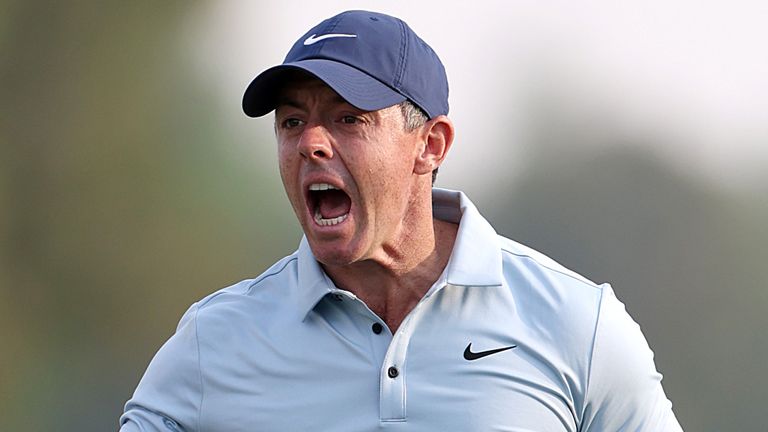 Rory McIlroy celebrates after his eagle on the 18th to force a playoff with Matt Fitzpatrick at the DP World Tour Championship