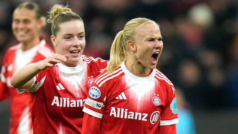 Bayern's Pernille Harder, right, reacts after scoring her side's second goal during the women's Champions League opening phase soccer match between FC Bayern Munich and Arsenal FC in Munich, Germany, Wednesday, Nov. 12, 2025. (AP Photo/Matthias Schrader)