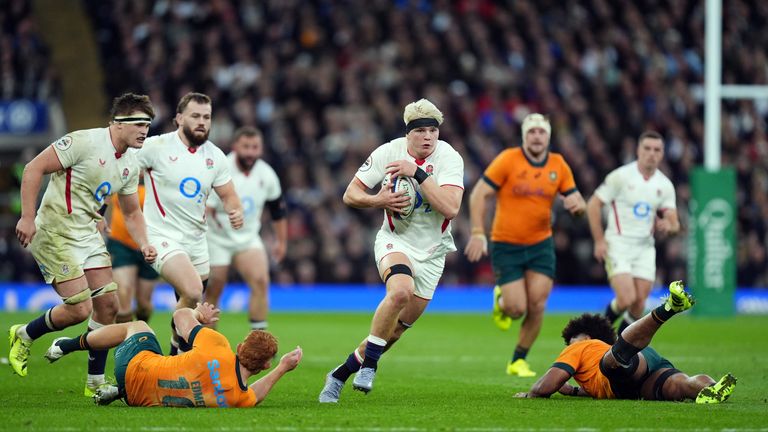 Henry Pollock on his way to scoring a try at Twickenham against Australia