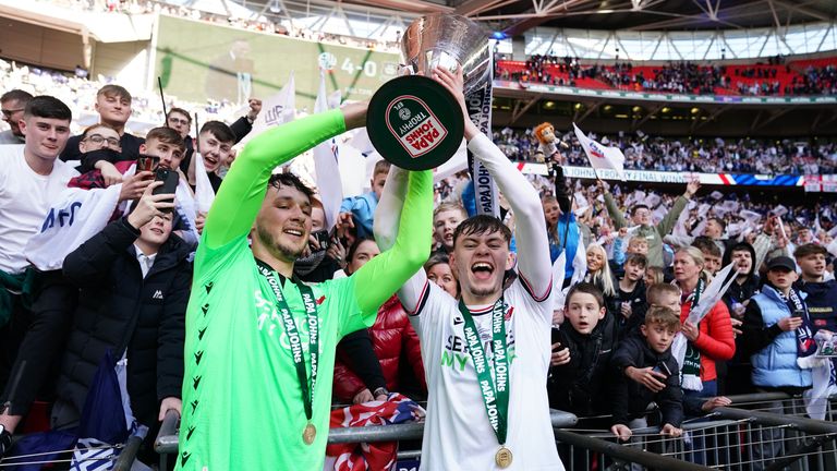 James Trafford and Conor Bradley celebrate winning the Football League Trophy with Bolton in 2023