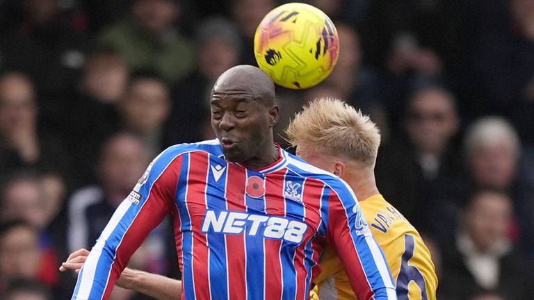 Crystal Palace's Jean-Philippe Mateta and Brighton's Jan Paul van Hecke battle for the ball 