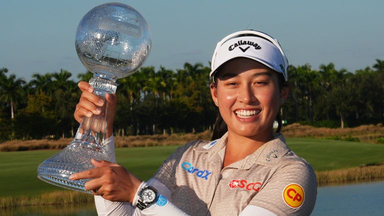 Jeeno Thitikul holds the CME Group Tour Championship trophy after winning the LPGA Tour event in Florida (Associated Press)