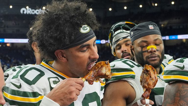 Green Bay Packers quarterback Jordan Love (10) eats a turkey leg following an NFL football game against the Detroit Lions in Detroit, Thursday, Nov. 27, 2025. (AP Photo/Paul Sancya)