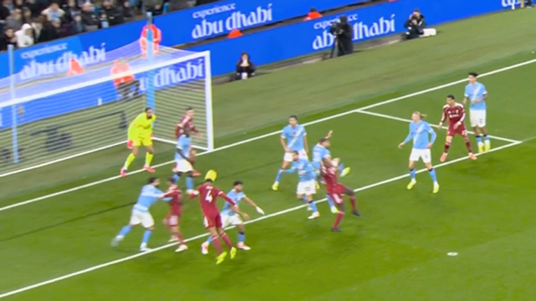 Liverpool's Virgil van Dijk has his header denied against Man City