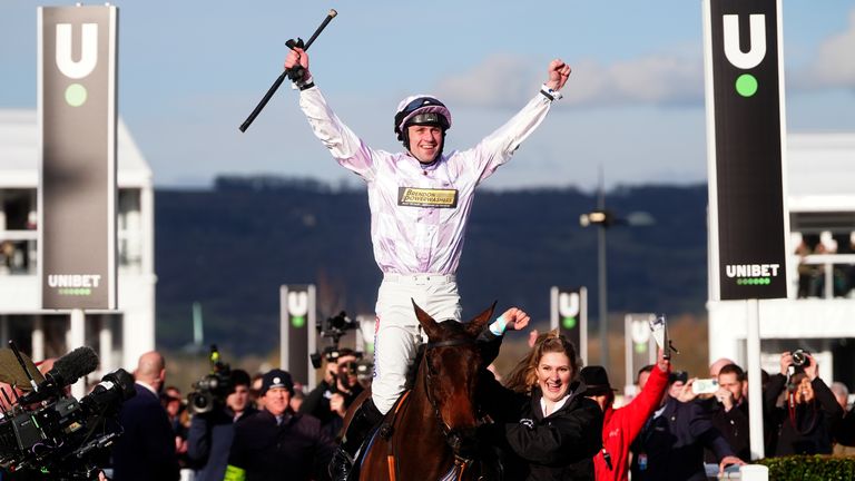 Jockey Lorcan Williams celebrates on Golden Ace after winning the Unibet Champion Hurdle Challenge Trophy