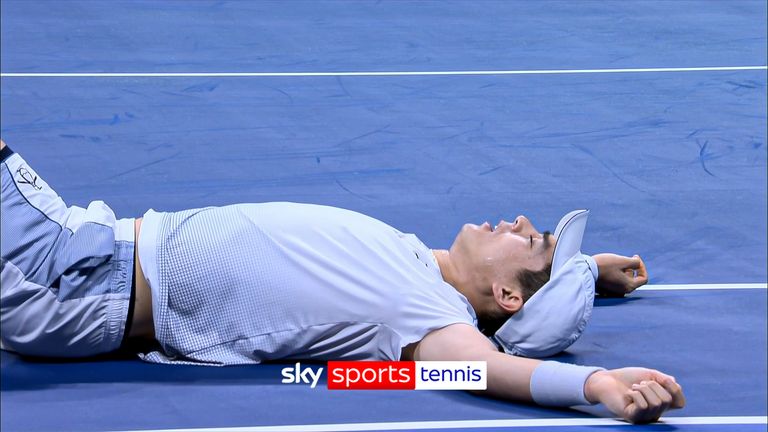 Mackenzie McDonaldlies on the floor after a 37-shot rally