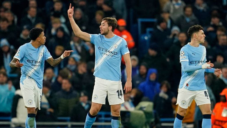 Manchester City's Nico Gonzalez gestures as he and teammates react after Leverkusen's Patrik Schick scored his sides second goal 