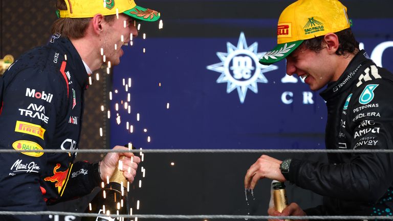 Max Verstappen and Kimi Antonelli on the Interlagos podium