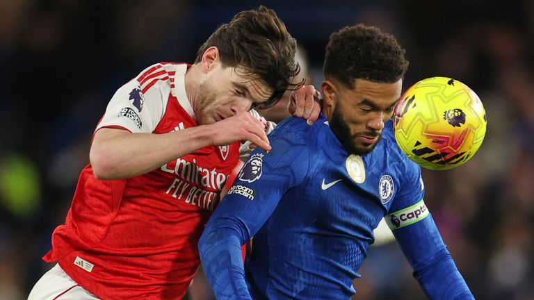 Declan Rice challenges for the ball with Reece James