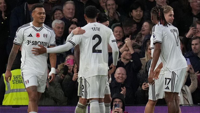 Fulham players celebrate after a Yerson Mosquera own goal gives them a 3-0 lead against Wolves