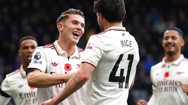 Viktor Gyokeres celebrates with Declan Rice after opening the scoring for Arsenal at Turf Moor