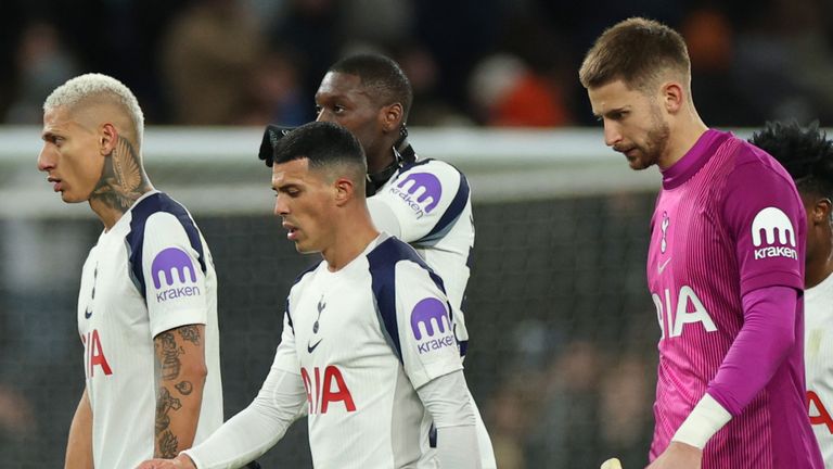 Tottenham players leave the field at half-time during the defeat to Fulham
