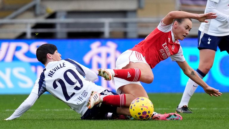 Caitlin Foord is tackled by Ashleigh Neville