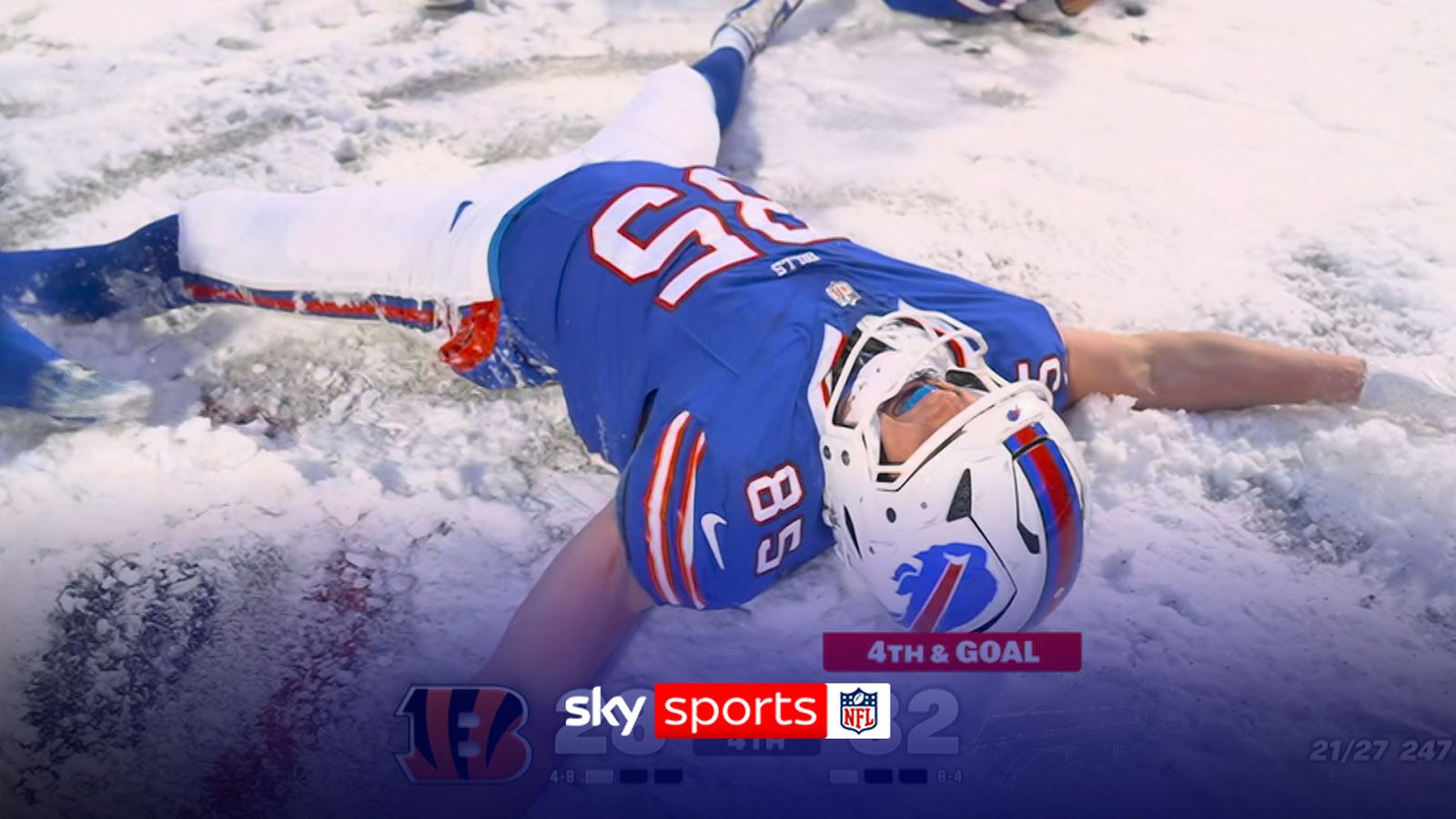 Buffalo Bills players dive into snow angels after touchdown!