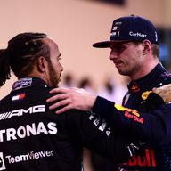 Lewis Hamilton and Max Verstappen embrace after the 2021 Abu Dhabi GP