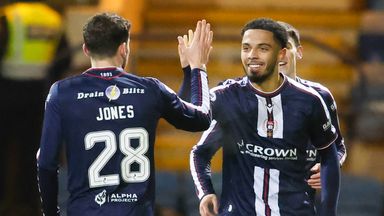 Dundee's Ashley Hay (R) celebrates after scoring to make it 1-1 