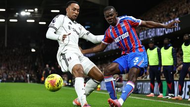 Kenny Tete of Fulham and Crystal Palace's Tyrick Mitchell battle for the ball