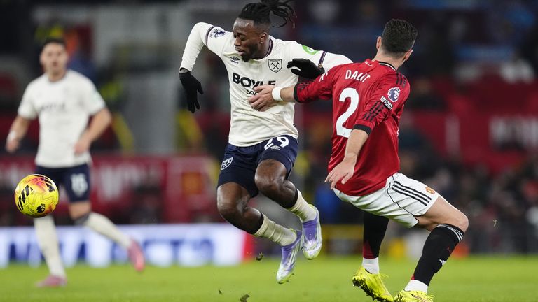 Aaron Wan-Bissaka tries to get past Diogo Dalot as West Ham took on Man Utd
