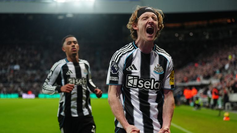 Newcastle United's Anthony Gordon celebrates after scoring his sides second goal from the penalty spot